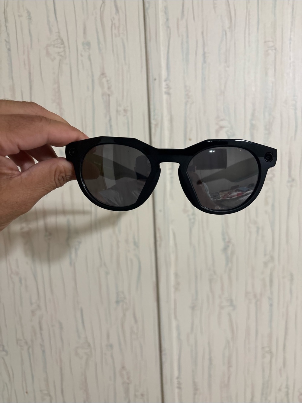 Oakley Black Round-Edge Sunglasses with Dark Lenses